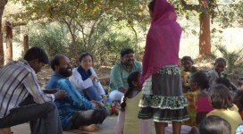 Adolescent girls and women folk discussing with UNICEF state head in Disha program village