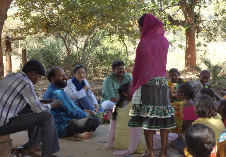 Adolescent girls and women folk discussing with UNICEF state head in Disha program village